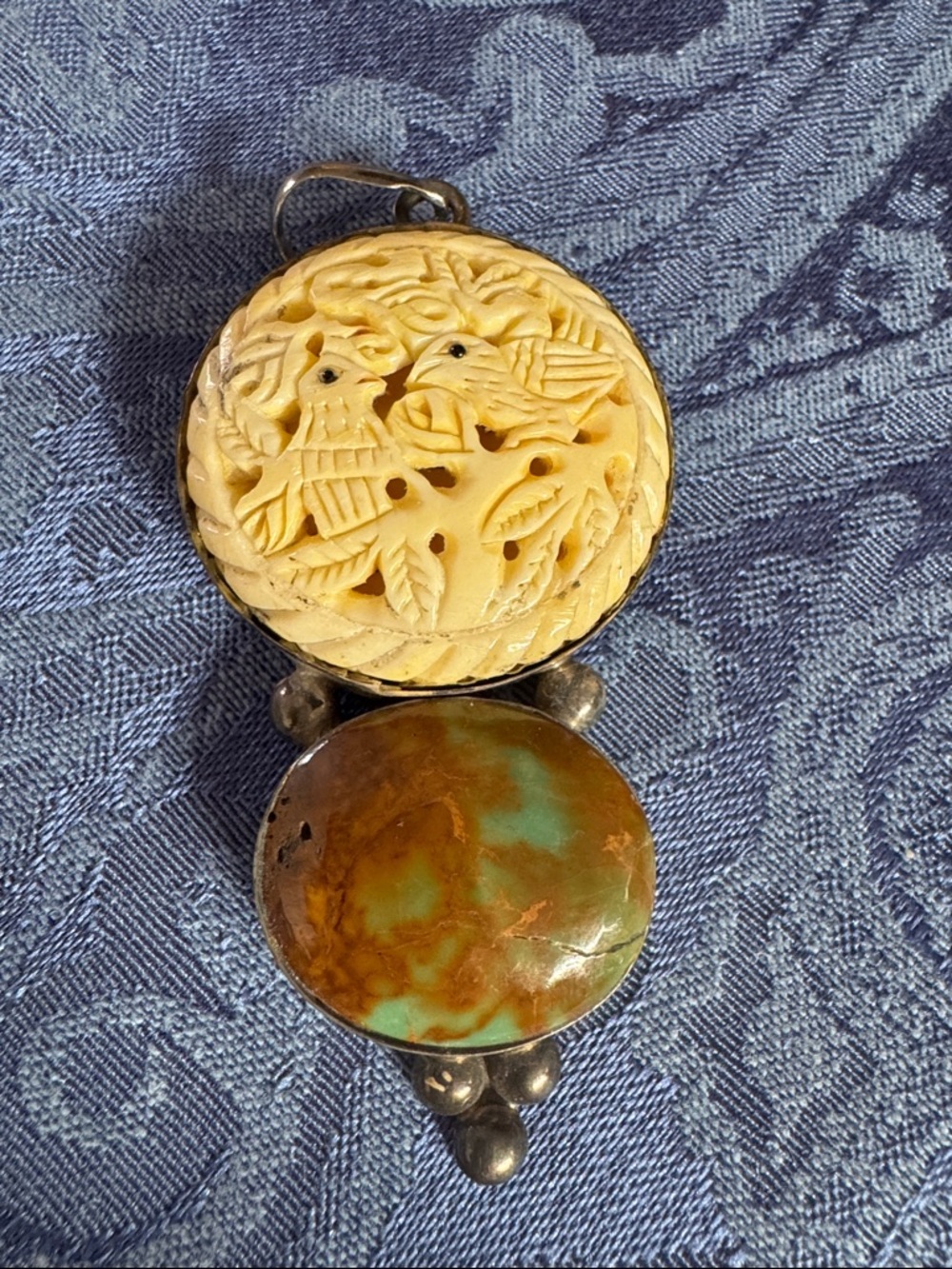 Carved Bird Pendant with brown Stone